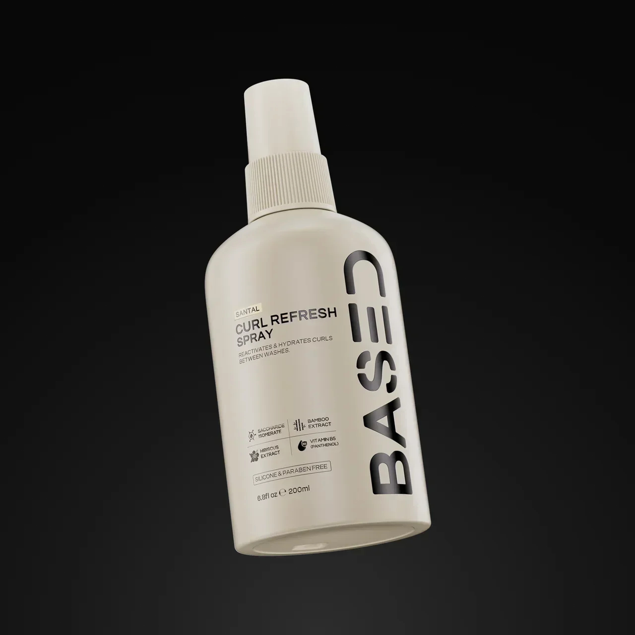 BASED Curl Refresh Spray bottle showing ingredient icons and size on a black background