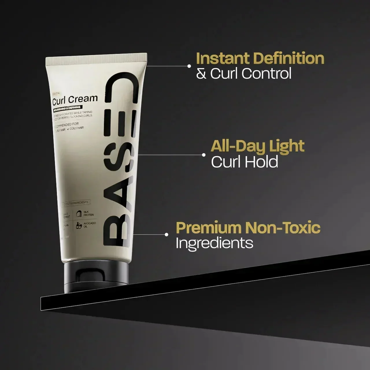 BASED Curl Cream tube balanced on an edge with callouts for curl definition, hold and ingredients.