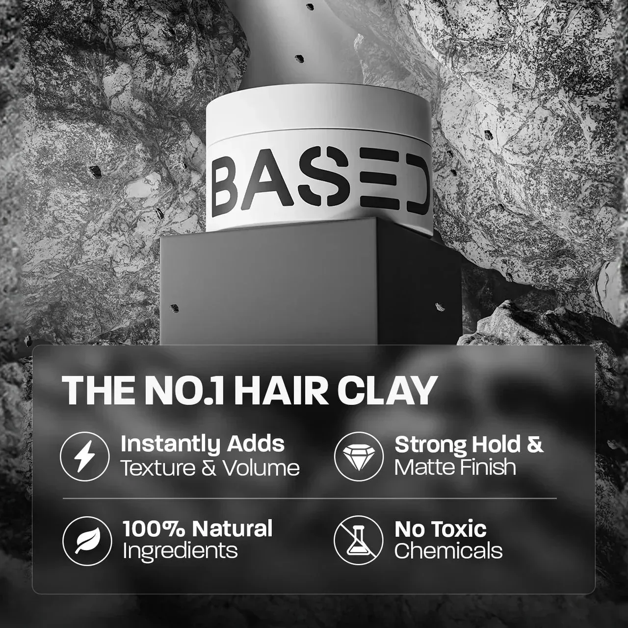 BASED Hair Clay jar on a rock pedestal with a texture, hold and finish benefits list